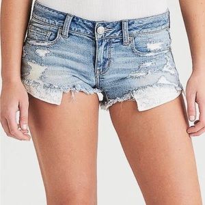 American Eagle blue Jean mini shorts with lace pockets.